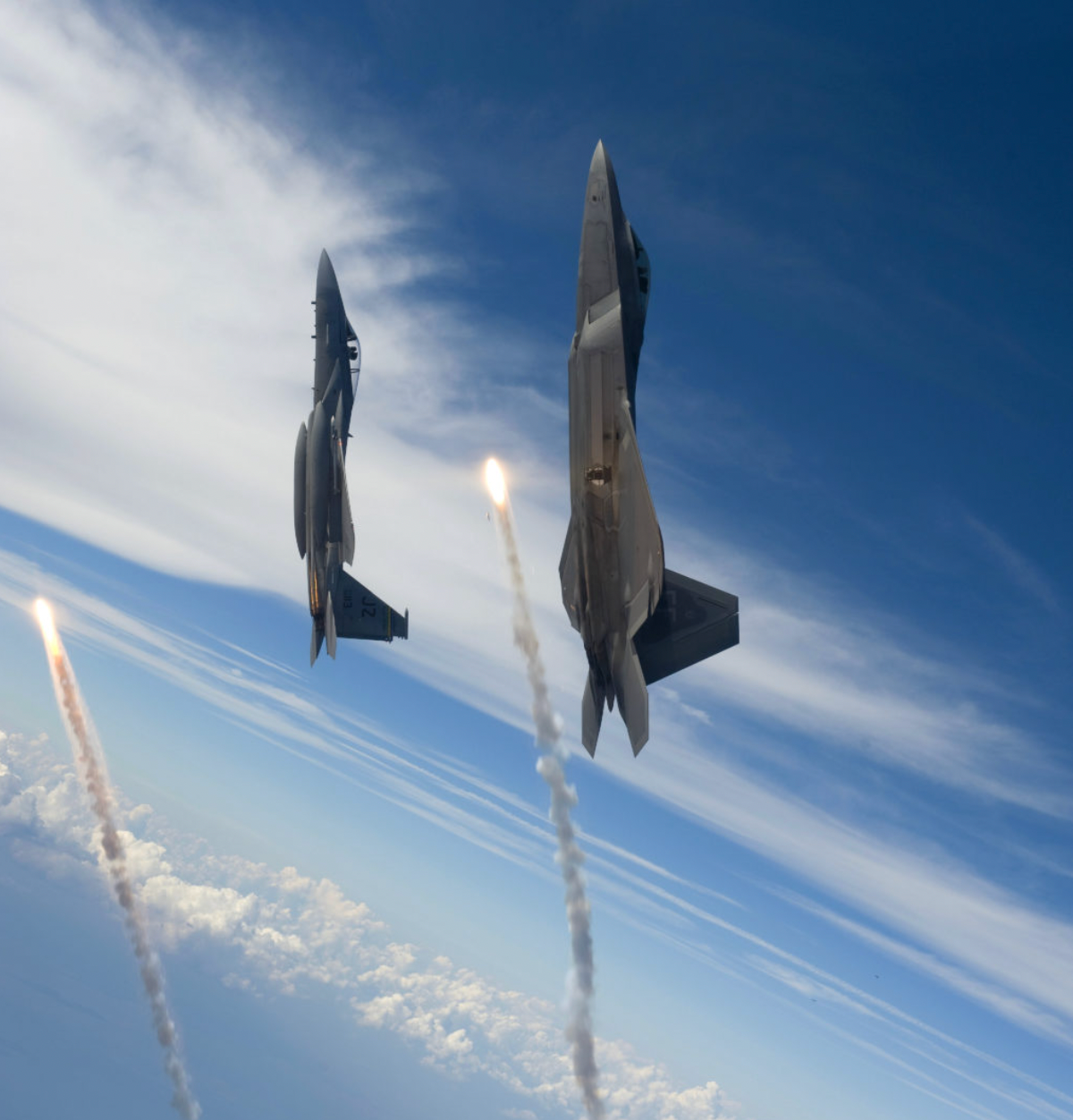 F-15 and F-22 deploy flares