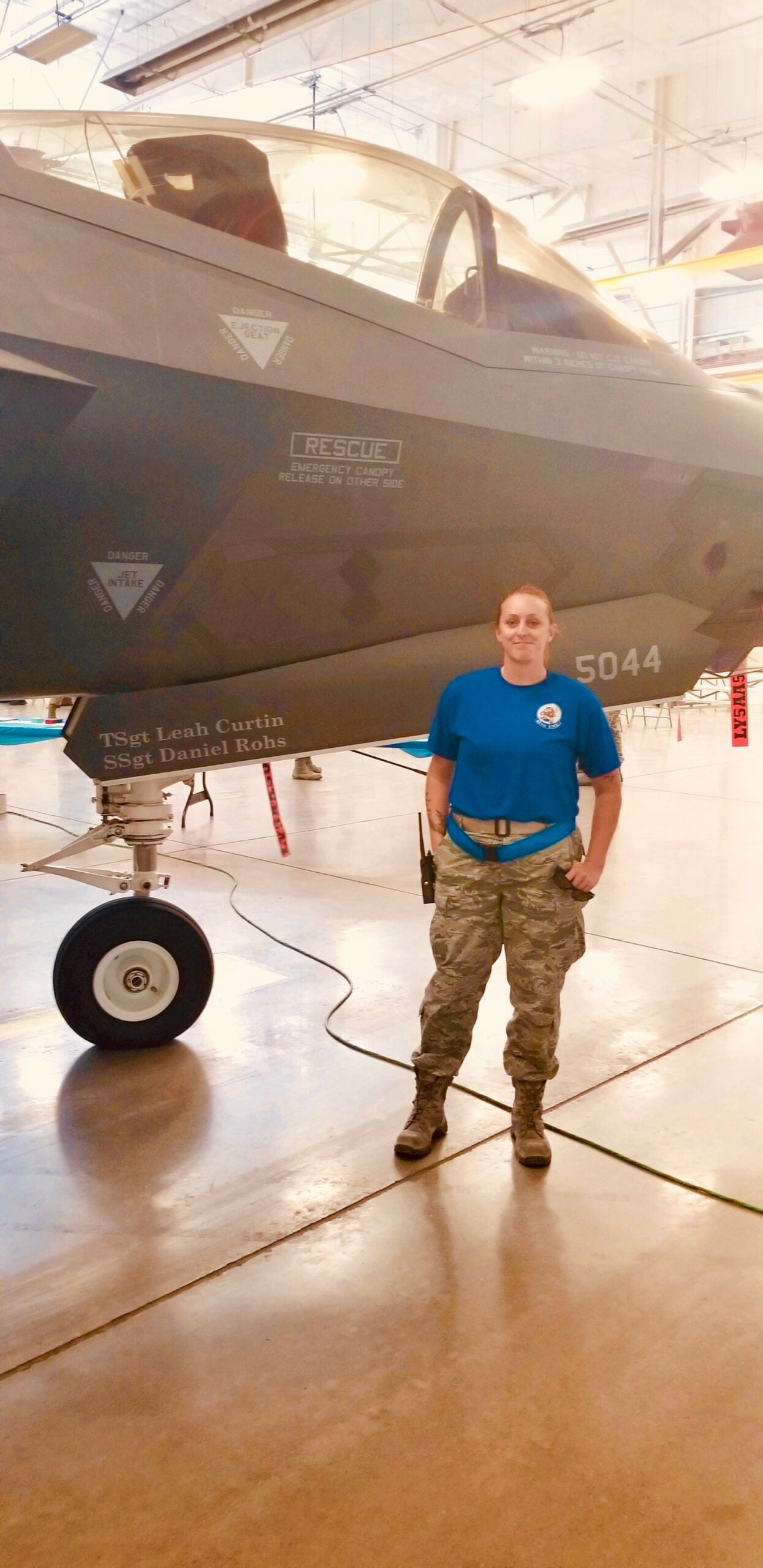 Then-Tech. Sgt. Leah Curtin poses with an F-35 with her name written on it at Luke Air Force Base, Arizona in 2018. (Photo courtesy Master Sgt. Leah Curtin)