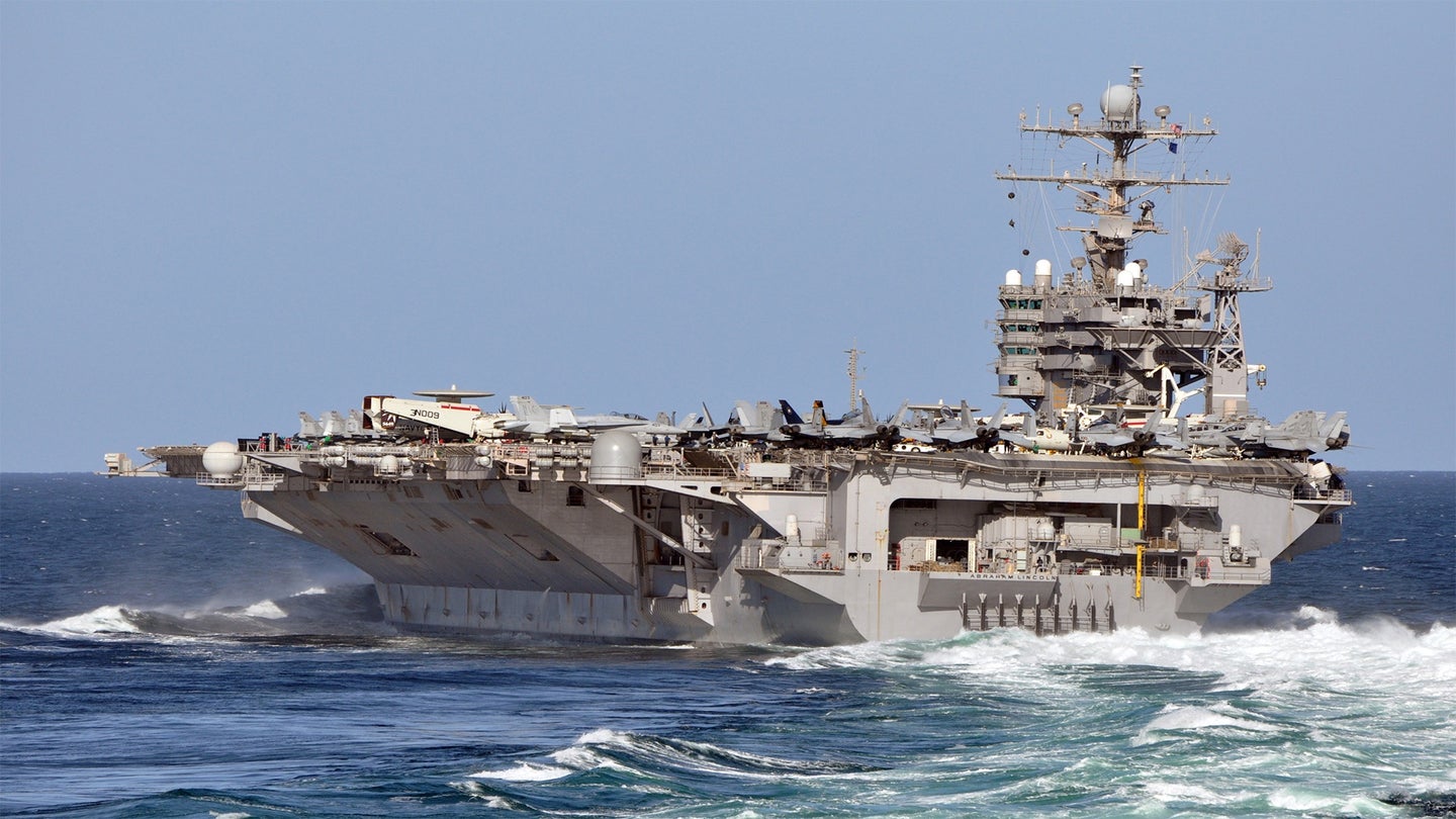 The aircraft carrier USS Abraham Lincoln maneuvers through a turn while underway in the U.S. 5th Fleet area of responsibility conducting maritime security operations and theater security cooperation efforts in 2010. (U.S. Navy photo by Capt. Lee Apsley)