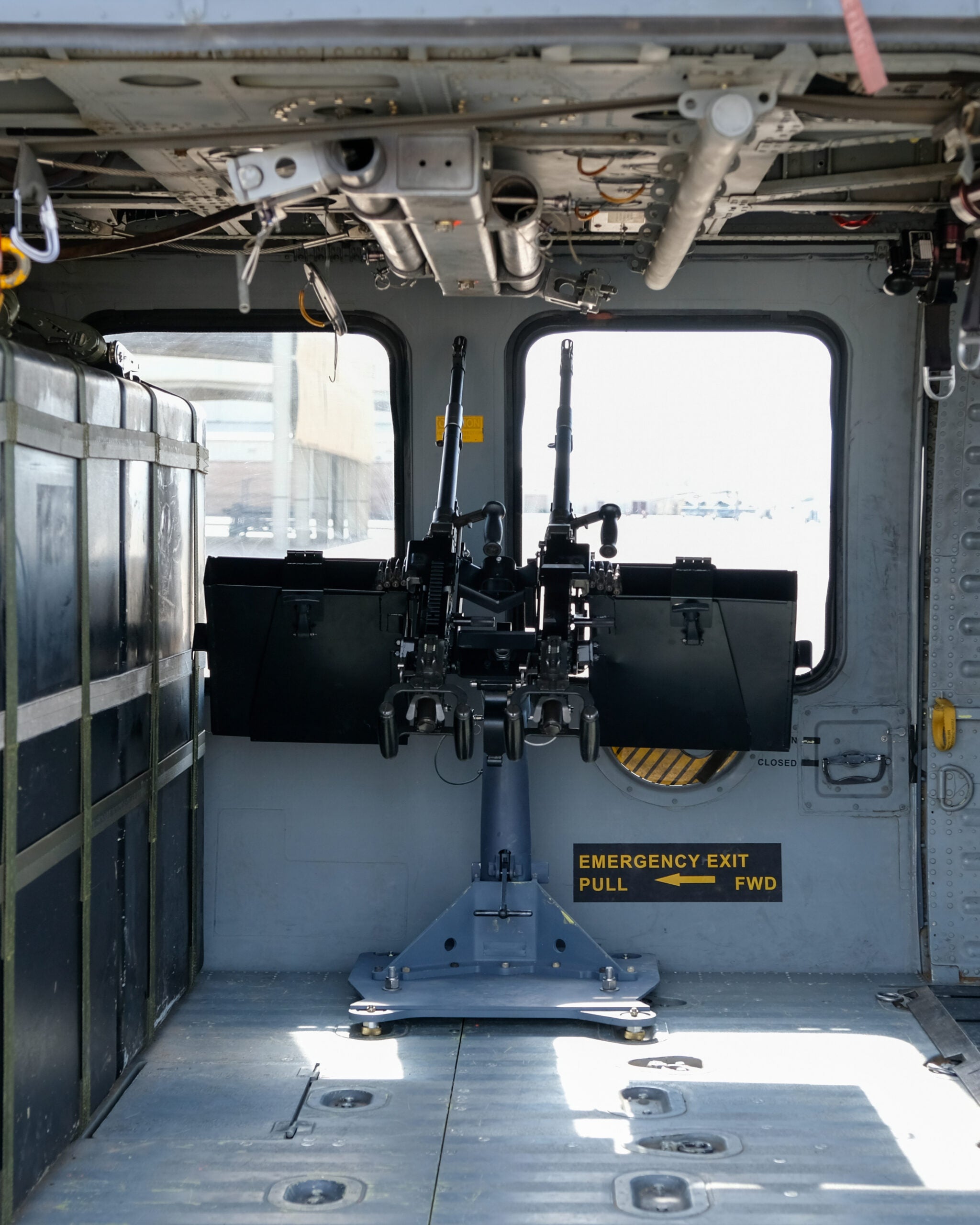 Two M240s are mounted inside an HH-60G Pave Hawk helicopter Nov. 22, 2022, at Davis-Monthan Air Force Base, Arizona. The 943d Rescue Group designed a concept to mount four additional M240 machine guns onto HH-60G helicopters to provide more firepower to the 920th Rescue Wing’s personnel recovery task force in contested environments. (U.S. Air Force photo by Andre Trinidad)