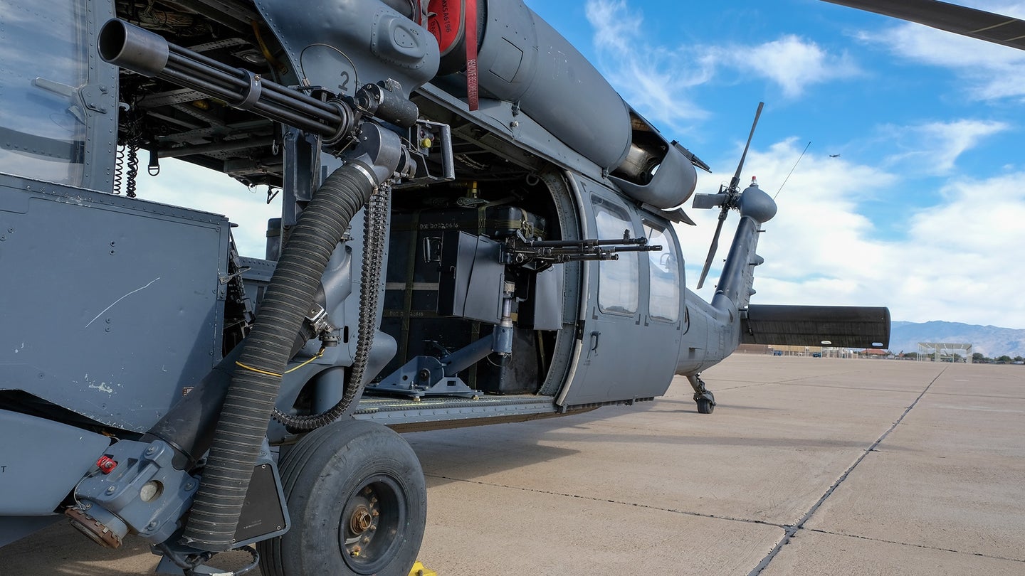 Two M240s are mounted inside an HH-60G Pave Hawk helicopter Nov. 22, 2022, at Davis-Monthan Air Force Base, Arizona. (Andre Trinidad/U.S. Air Force)