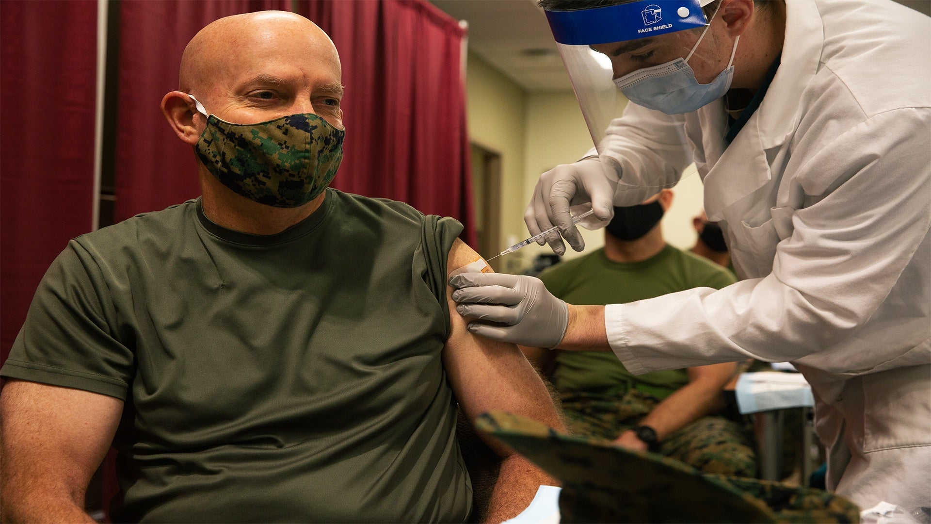 Commandant of the Marine Corps Gen. David H. Berger receives the COVID-19 vaccine as part of Operation Warp Speed at Walter Reed National Military Medical Center, Maryland, Dec 22, 2020. (Lance Cpl. Tyler W. Abbott/U.S. Marine Corps)