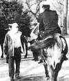 Tennessee Denton (left) was a civilian mule farmer who helped the midshipmen kidnap the West Point mules. (Screenshot via The LOG Magazine/U.S. Navy)