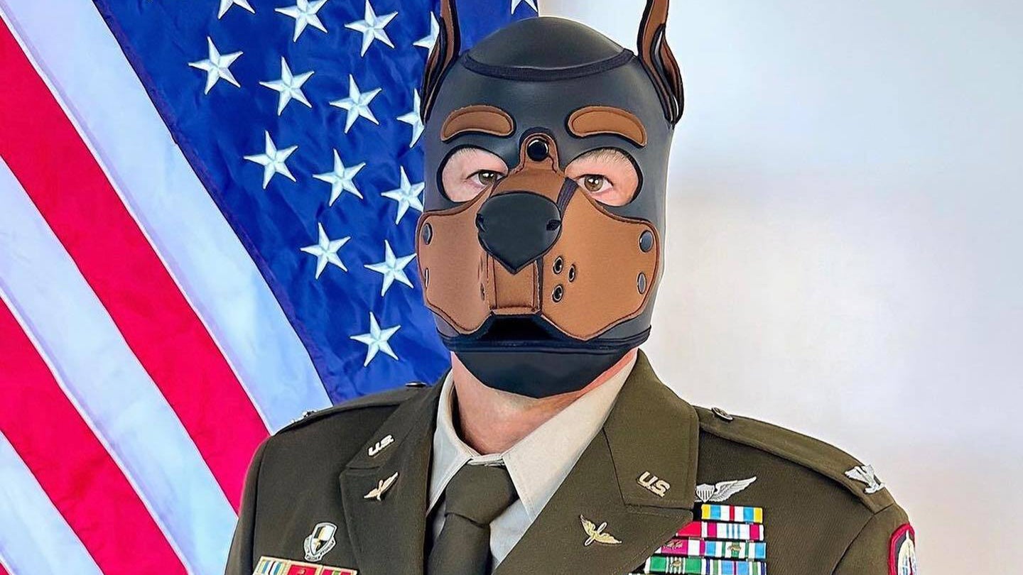 The Army is investigating a number of social media posts that appear to show soldiers wearing dog-themed bondage masks in uniform. (Screenshot via Twitter)