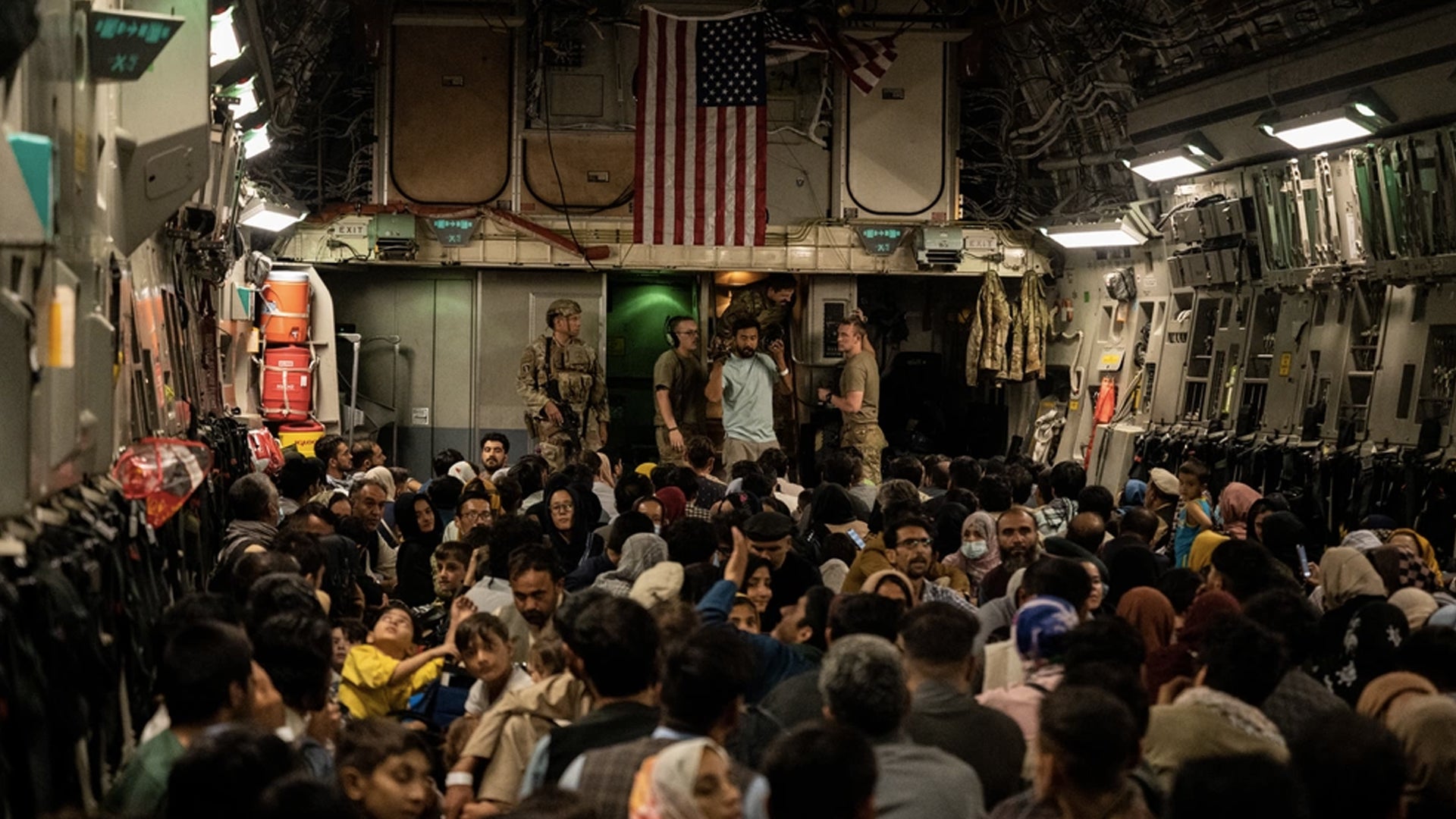 A view inside an Air Force C-17 transporting Afghan evacuees during Operation Allies Refuge. (Staff Sgt. Brandon Cribelar/U.S. Air Force)