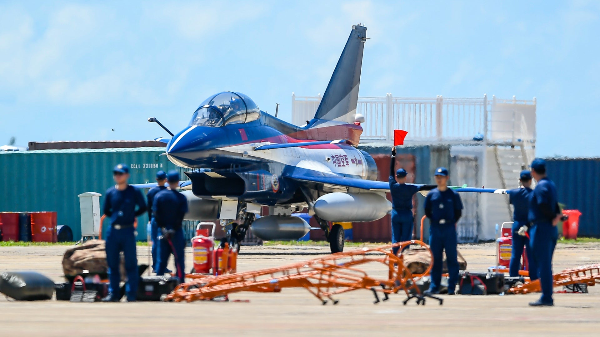A fighter jet of the Bayi Aerobatics Team of the Chinese People's Liberation Army (PLA) Air Force arrives at Zhuhai International Airshow Center before Airshow China 2021 on September 22, 2021 in Zhuhai, Guangdong Province of China. (Photo by Chen Jimin/China News Service via Getty Images)