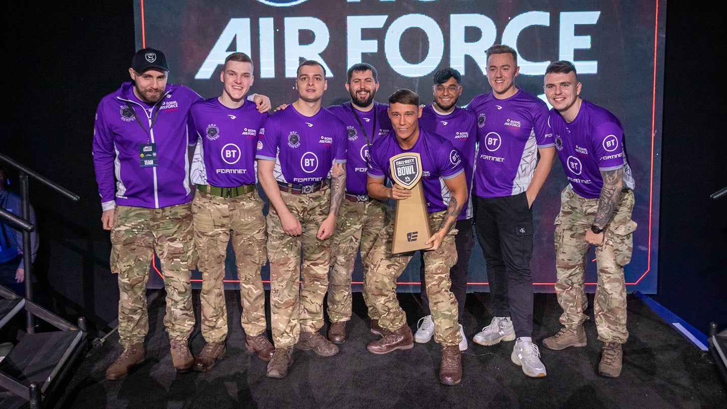 The Royal Air Force's esports team celebrates after winning the tournament. (Photo via the Call of Duty Endowment)