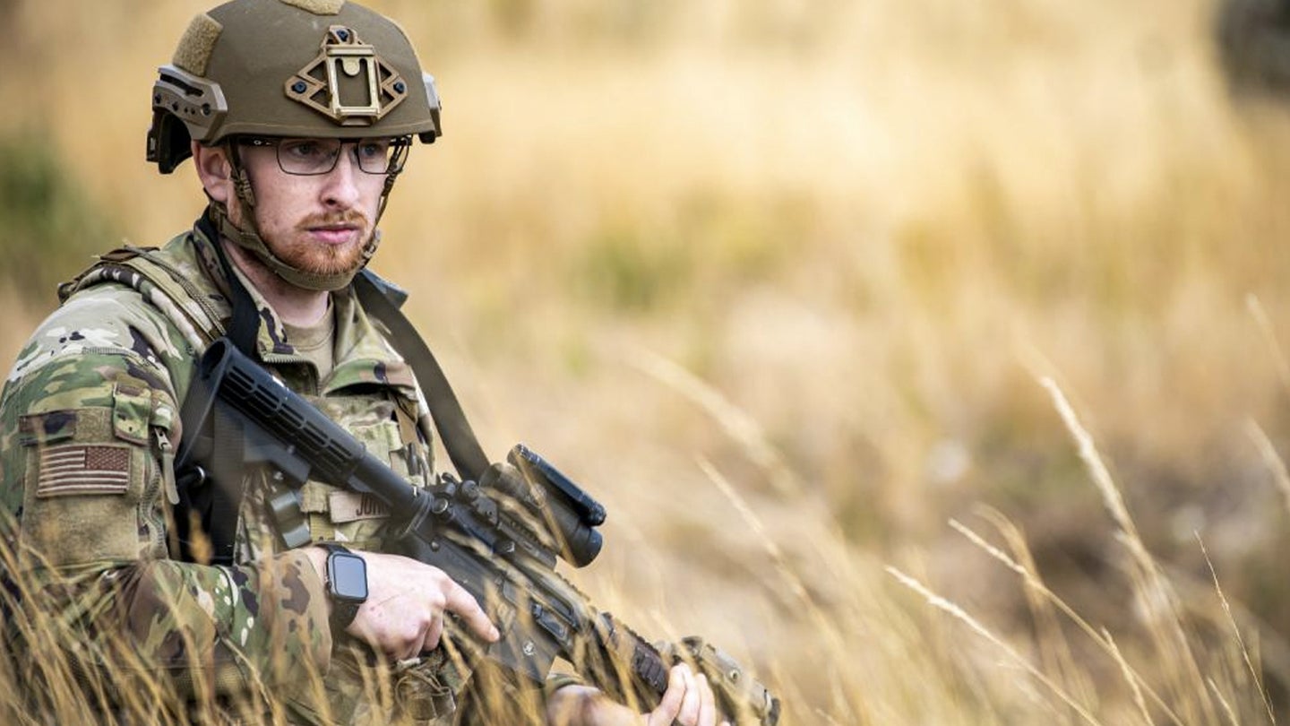 U.S. Air Force Airman 1st Class Isaac John, 423d Security Forces Squadron flight member, holds his position during a field training exercise at Stanford Training Area, England, Aug. 17, 2022. (Staff Sgt. Eugene Oliver/U.S. Air Force)