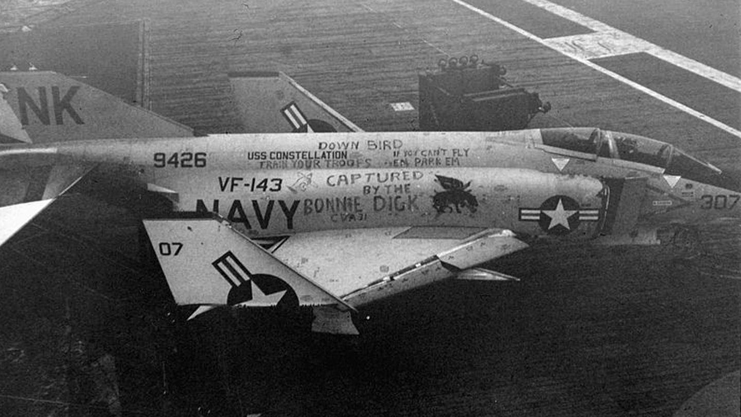 A U.S. Navy McDonnell F-4B-9-MC Phantom II (BuNo 149426) of Fighter Squadron VF-143 "Pukin' Dogs" aboard the aircraft carrier USS Bon Homme Richard (CVA-31). VF-143 was assigned to Carrier Air Wing 14 (CVW-14) aboard the USS Constellation (CVA-64) between 1962 and 1964. This aircraft landed either by mistake or due to an emergency aboard the small Essex-class carrier which did not operate the F-4. (U.S. Navy/Wikimedia)