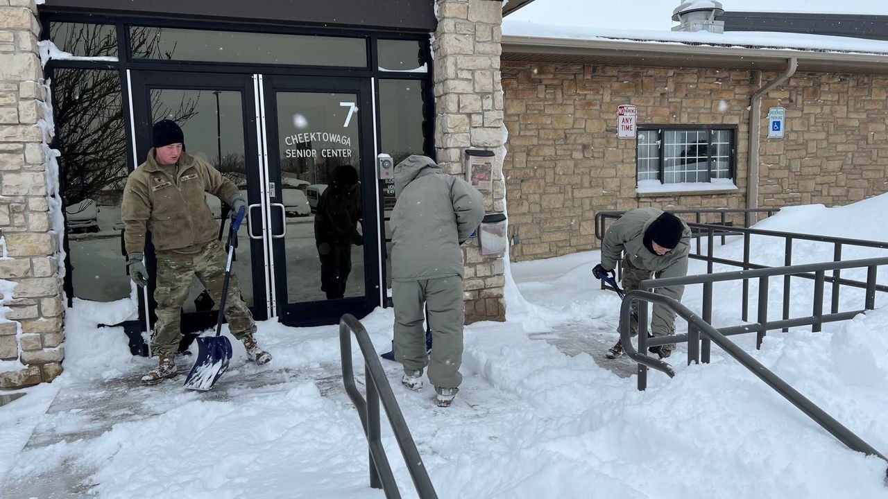Members of the New York National Guard clear paths for trapped communities during the blizzard. (Photo courtesy New York National Guard)