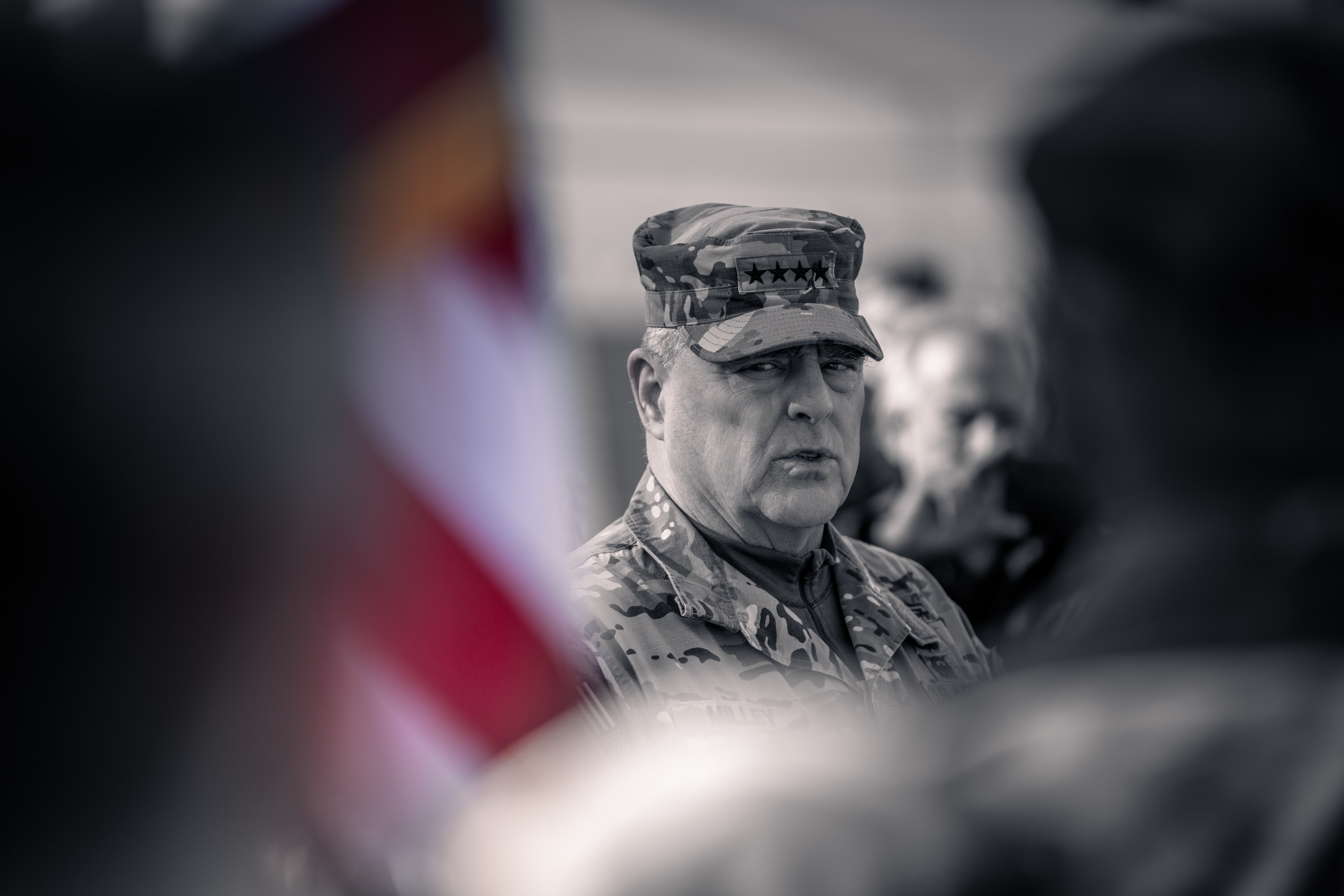 U.S. Army Gen. Mark A. Milley, Chairman of the Joint Chiefs of Staff, speaks to international reporters, during a visit to Adazi, Latvia on March 5, 2022. Gen. Milley, the highest-ranking U.S. military officer, joined with United States Ambassador to Latvia John Carwile, U.S. Army Europe and Africa commander Gen. Christopher Cavoli, and Latvian Lt. General Leonidis Kalnins to speak with NATO troops currently in Latvia. Gen. Milley said that recent U.S. troop deployments demonstrate our commitment to NATO Article 5 and told the troops present that their mission is to stand shoulder to shoulder in defending NATO against any aggression. (U.S. Army photo illustration by Maj. Robert Fellingham, color saturation has been altered for visual effect)