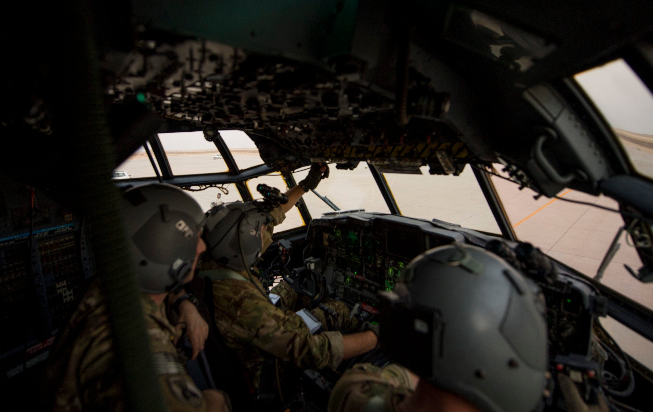 U.S. Air Force aircrew members assigned to the the 16th Expeditionary Special Operations Squadron perform pre flight checks onboard a AC-130W Stinger II before a mission in support of Operation Inherent Resolve, Southwest Asia, July 23, 2018. The AC-130W include a mission management console, communications suite, two electro-optical/infrared sensors, fire control equipment, precision guided munitions delivery capability; and one side-firing, trainable 30mm gun with tracer-less ammunition and associated munitions storage system. The mission management system will fuse sensor, communication, environment, order of battle and threat information into a common operating picture. The AC-130W Stinger II Precision Strike Package modification provides ground forces an expeditionary, persistent direct fires platform that delivers precision low-yield munitions, ideally suited for close air support and urban operations.(U.S. Air Force photo by Staff Sgt. Keith James)