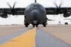 A U.S. Air Force 16th Special Operations Squadron AC-130J Ghostrider arrives at Cannon Air Force Base, New Mexico, April 18, 2022. The arrival of the AC-130J Ghostrider represents a significant expansion of force generation capacity as the Air Force Special Operations Command structures for the reemergence of great power competition, demanding significant transformation to ensure Air Commandos are ready to successfully operate in full-spectrum operations. (U.S. Air Force photo by Airman 1st Class Cassidy Thomas) (This photo has been altered for security purposes by blurring out identification numbers and equipment)