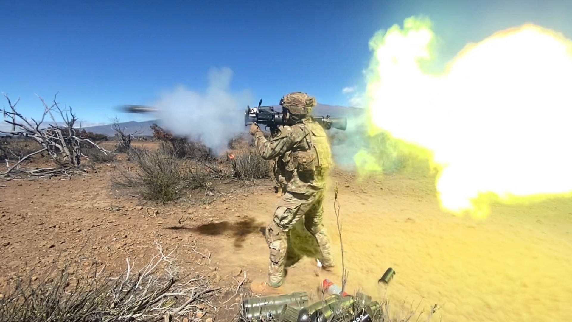 Spc. Jacob Pinola, a cavalry scout assigned to C Troop, 3rd Squadron, 4th Cavalry Regiment, 3rd Infantry Brigade Combat Team, 25th Infantry Division fires a Carl Gustav recoilless rifle during a live-fire training event at Pōhakuloa Training Area, Hawaii Feb. 10, 2022. (U.S. Army photo by Staff Sgt. Brendan Spangler)
