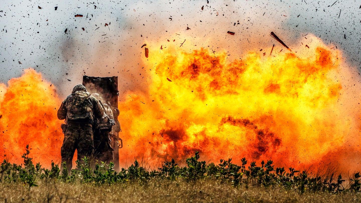 Combat engineers from the 2nd Armored Brigade Combat Team, 1st Cavalry Division blast through a concrete wall during demolition training at Curry Demo July 17.