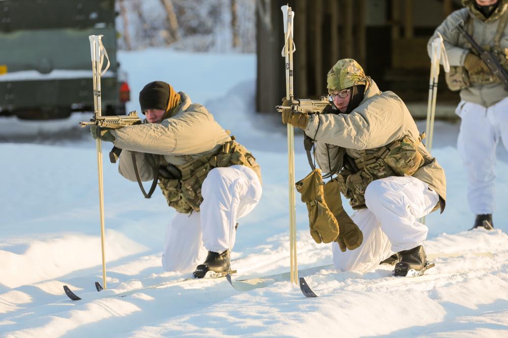 American soldiers are jumping into freezing water to learn Arctic warfare