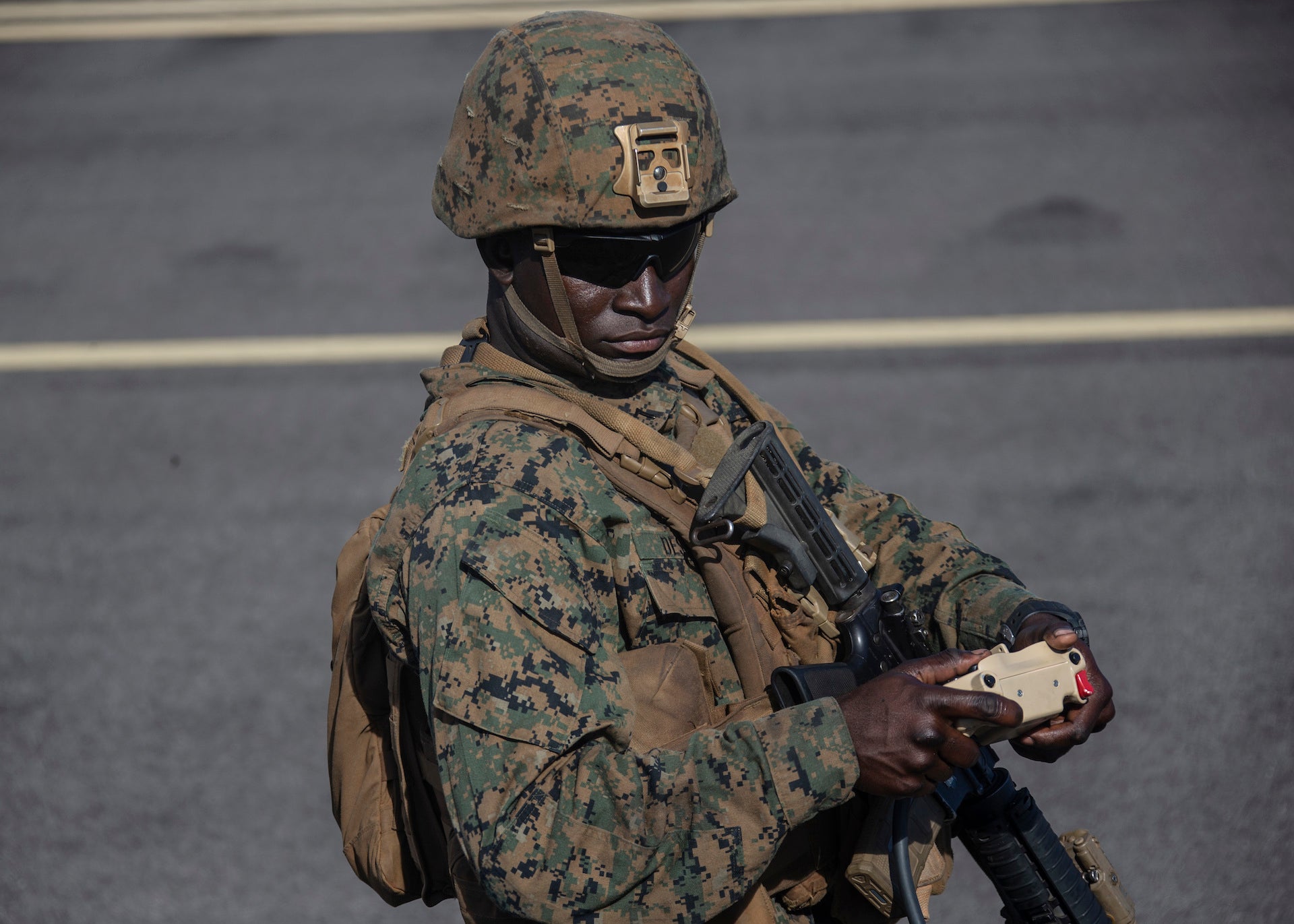 Pfc. Guerby Destine, 22, number two cannon cocker with 1st Battalion, 12th Marines and a Westbury, N.Y., native, drives a Navy Marine Expeditionary Ship Interdiction System launcher aboard Pacific Missile Range Facility Barking Sands, Hawaii, Aug. 15, 2021. The Marines of 1/12 struck a naval target ship with two Naval Strike Missiles after sensing and targeting the vessel from their fires expeditionary advanced base while participating in Large Scale Exercise 2021. The exercise allowed Marines to support distributed maritime operations by providing expeditionary advanced base operations and littoral operations in a contested environment. More than 25,000 Marines and sailors took part in LSE 2021 from five numbered fleets and all three Marine Expeditionary Forces. (U.S. Marine Corps photo by Cpl. Luke Cohen, released)