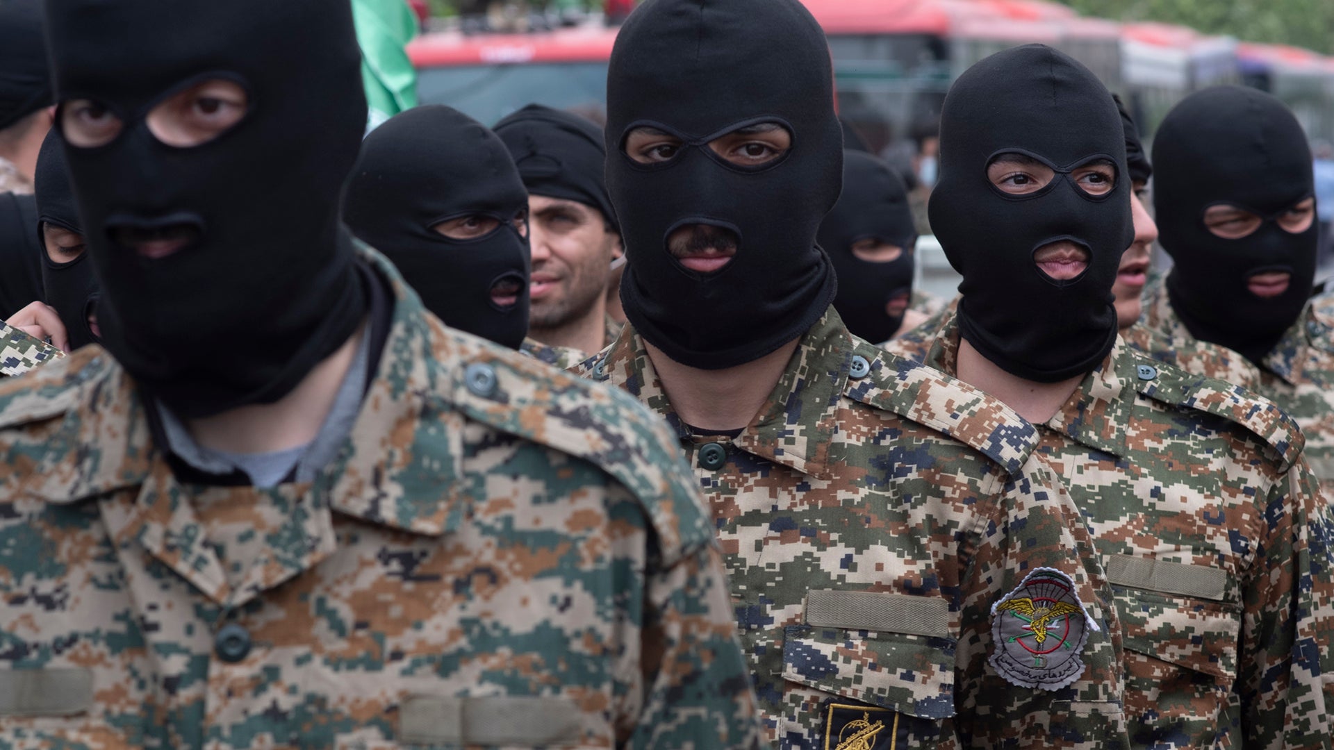 Islamic Revolutionary Guard Corps (IRGC) military personnel stand guard on an avenue in downtown Tehran during a rally commemorating the International Quds Day, also known as the Jerusalem day, on April 29, 2022. (Photo by Morteza Nikoubazl/NurPhoto via Getty Images)
