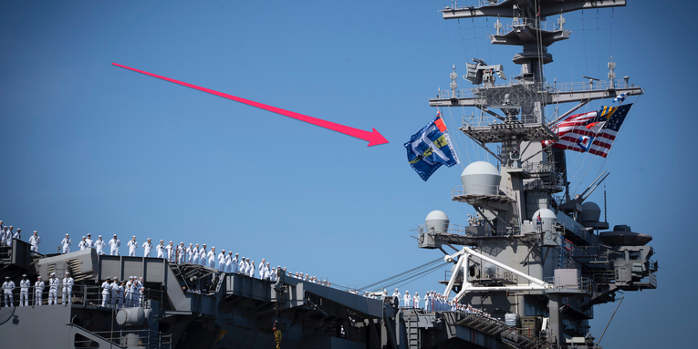 USS George HW Bush aircraft carrier rocks battle flag on return home from deployment