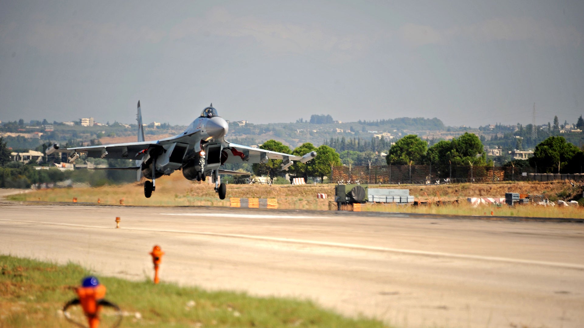 A Russian Sukhoi Su-35 fighter takes off at the Russian military base of Hmeimim, located south-east of the city of Latakia in Hmeimim, Latakia Governorate, Syria, on September 26, 2019. - With military backing from Russia, President Bashar al-Assad's forces have retaken large parts of Syria from rebels and jihadists since 2015, and now control around 60 percent of the country. Russia often refers to troops it deployed in Syria as military advisers even though its forces and warplanes are also directly involved in battles against jihadists and other rebels (Photo by Maxime POPOV / AFP)        (Photo credit should read MAXIME POPOV/AFP via Getty Images)