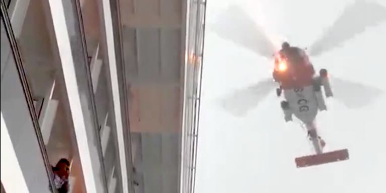 Video shows Coast Guard helicopter narrowly avoiding crashing during rescue at sea