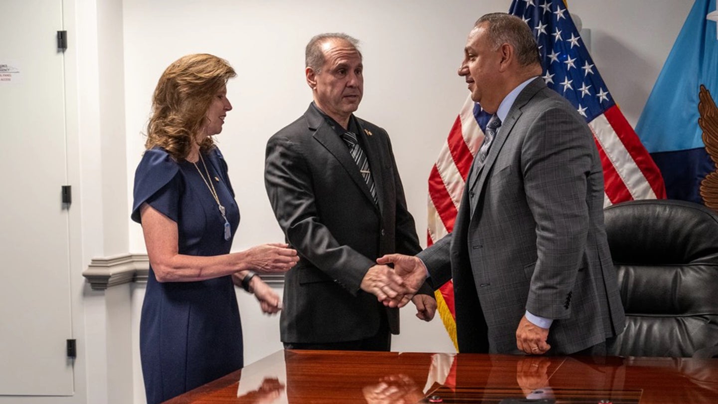 Teri and Patrick Caserta with Under Secretary of Defense for Personnel and Readiness Gilbert Cisneros, Jr., who signed a policy to implement the Brandon Act on May 5, 2023. (Photo courtesy of Teri Caserta) 