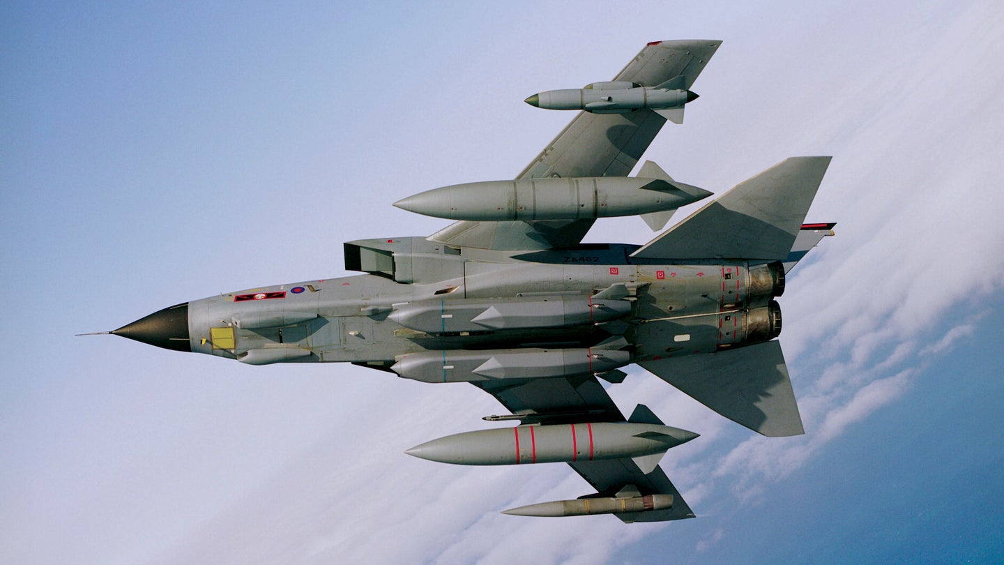 A Royal Air Force Tornado GR4 aircraft carrying two Storm Shadow missiles under the fuselage in August 2013. (UK Ministry of Defense/Geoff Lee)