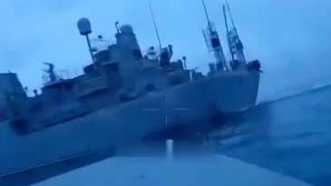 Videos of Ukrainian drone boats swarming a Russian target end in explosion, mystery