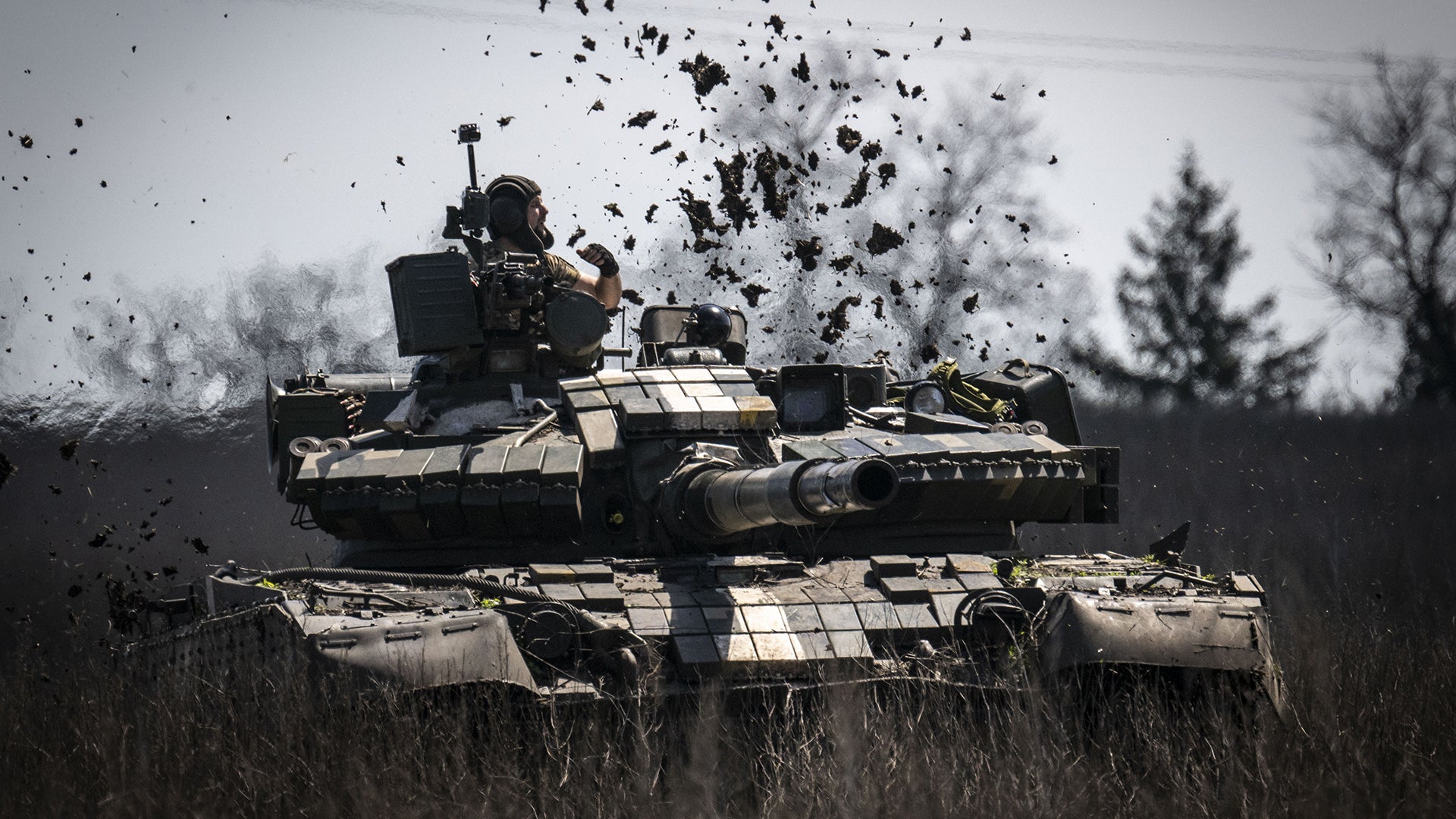 DONETSK OBLAST, UKRAINE - APRIL 26: Ukrainian crews operate and fire the tanks on ranges in tough terrain conditions as the Russia-Ukraine war continues in Donetsk Oblast, Ukraine on April 26, 2023. (Photo by Muhammed Enes Yildirim/Anadolu Agency via Getty Images)