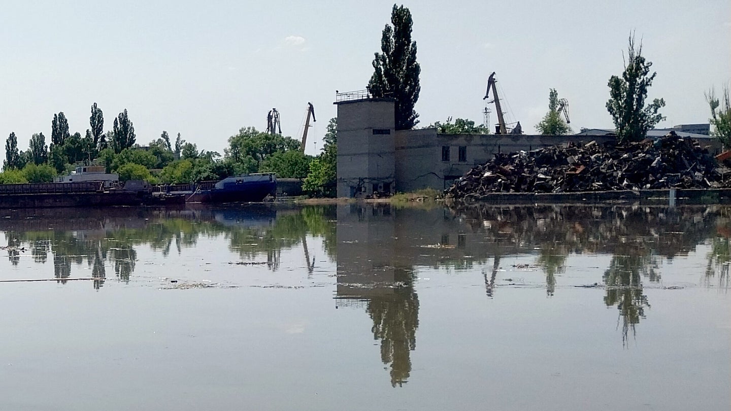 Flooded land around Kherson on June 6, following the damage of the Kakhova Dam. (Photo by Sergiy Dollar / AFP)