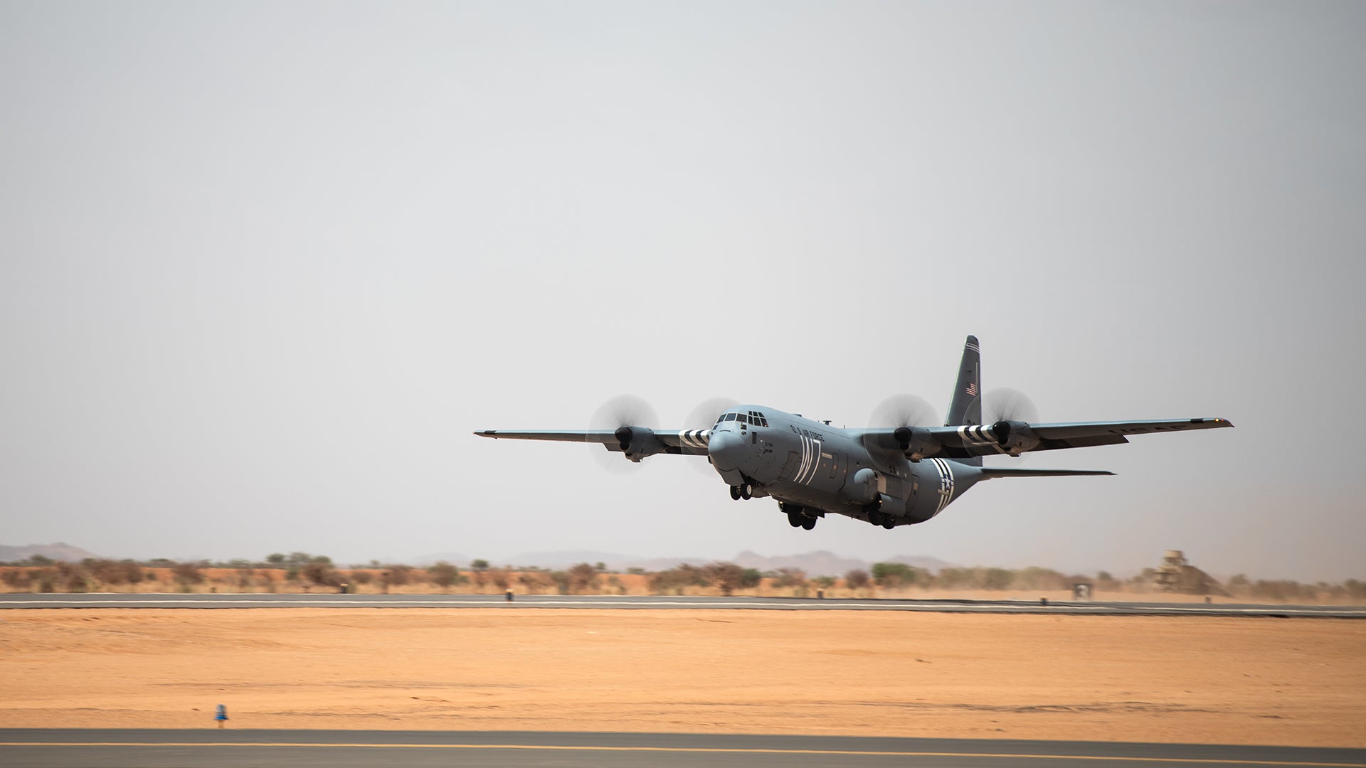 FILE: A U.S. Air Force C-130J Super Hercules assigned to the 37th Airlift Squadron at Ramstein Air Base, Germany, takes off from the new runway at Nigerien Air Base 201, Agadez, Niger, Aug. 3, 2019. The 6200-ft runway allows the Air Force to move assets in and out of Air Base 201 and is capable of supporting any aircraft up to a C-17 Globemaster III. (U.S. Air Force photo by Staff Sgt. Devin Boyer)