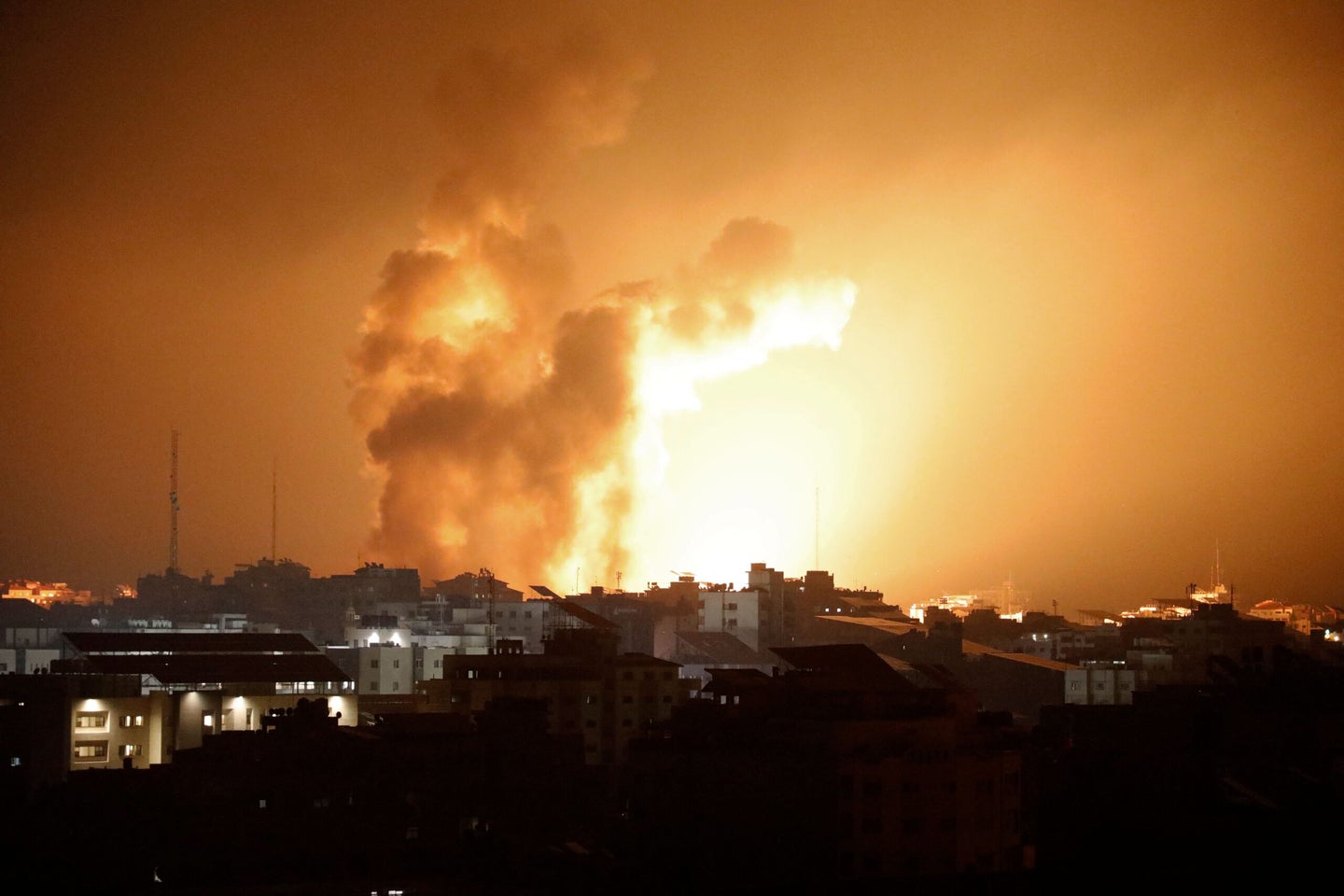 An Israeli airstrike hits Gaza City in the early hours of Oct. 8, 2023. (Photo by EYAD BABA/AFP via Getty Images)