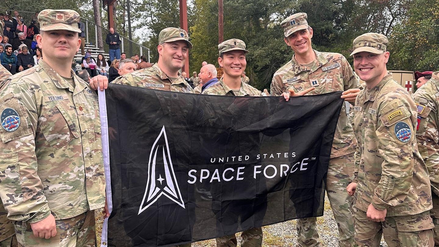 Capt. Daniel Reynolds (right) became the first Space Force Guardian to earn the Ranger tab. (Photo courtesy U.S. Army)