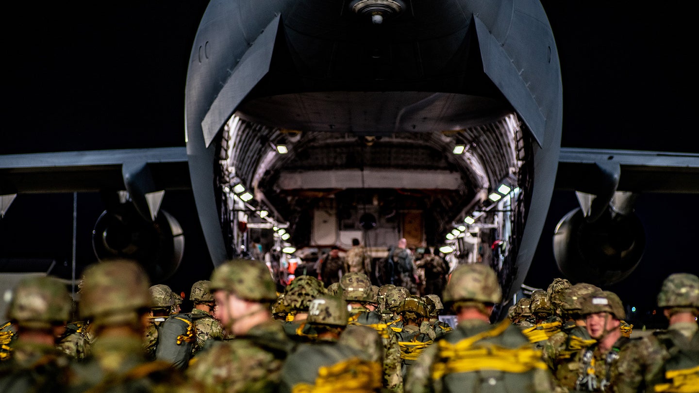 Soldiers board a C-17