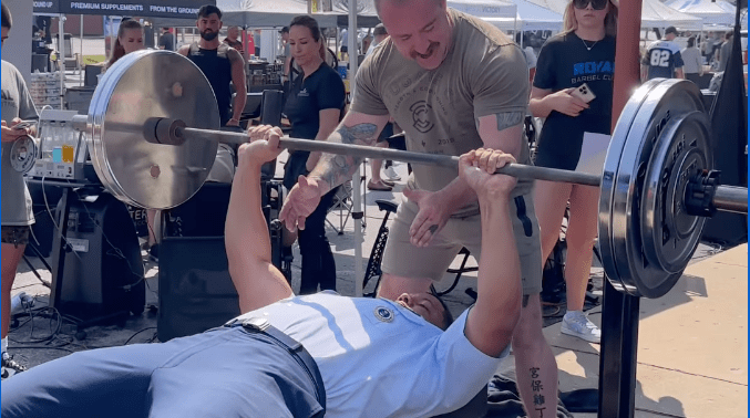 Watch an Air Force recruiter bench press 285 pounds 15 times — in his blues!