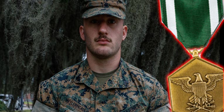 Marine receives medal for saving woman from ocean during storm