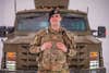 Airman 1st Class Connor Crawn, 341st Missile Security Operations Squadron convoy teamleader, stands in front of a ballistic engineered armored response counterattack truck on aflightline at Malmstrom Air Force Base, Mont., Nov. 8, 2022. Crawn, member of theKanien;kehà:ka Tribe, went against his faith and cut his hair to join the Air Force in 2021. Afternearly two years after requesting a religious accommodation to grow his hair long again, Crawnwas granted approval in October. (U.S. Air Force photo by Airman 1st Class Mary A. Bowers)