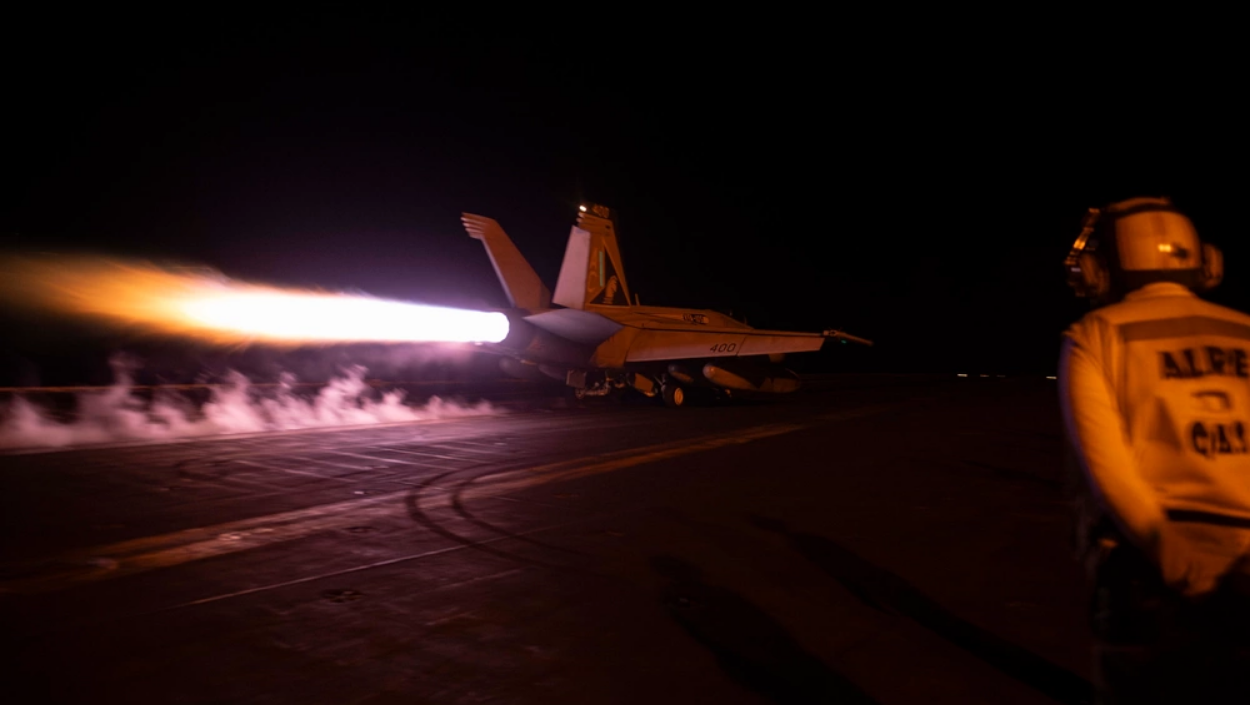 A fighter jet launches from the USS Dwight D. Eisenhower in the Red Sea on Feb. 3, 2024. (photo by Mass Communication Specialist 3rd Class Janae Chambers/U.S. Navy)
