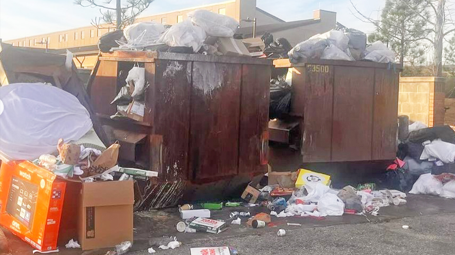 Soldiers stationed at Fort Liberty say a slow down in trash collection has led to overflowing dumpsters across the base. Photo from "@Fancy_fancy_bear" on Instagram.