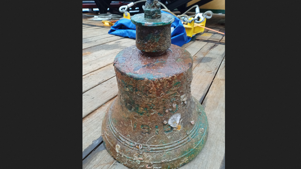 The recovered bell from the destroyer the USS Jacob Jones, which was sunk in 1917. (Image courtesy by U.K. Ministry of Defence, Salvage and Marine Operations)