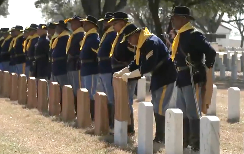 The Department of Veterans Affairs unveiled the new headstones at the Fort Sam Houston National Cemetery for the all-Black Buffalo soldiers of the 3rd Battalion, 24th Infantry Regiment who were hanged by the U.S. military for their involvement in a mutiny during the race riots in Houston in 1917. Screenshot from Veterans Affairs video.