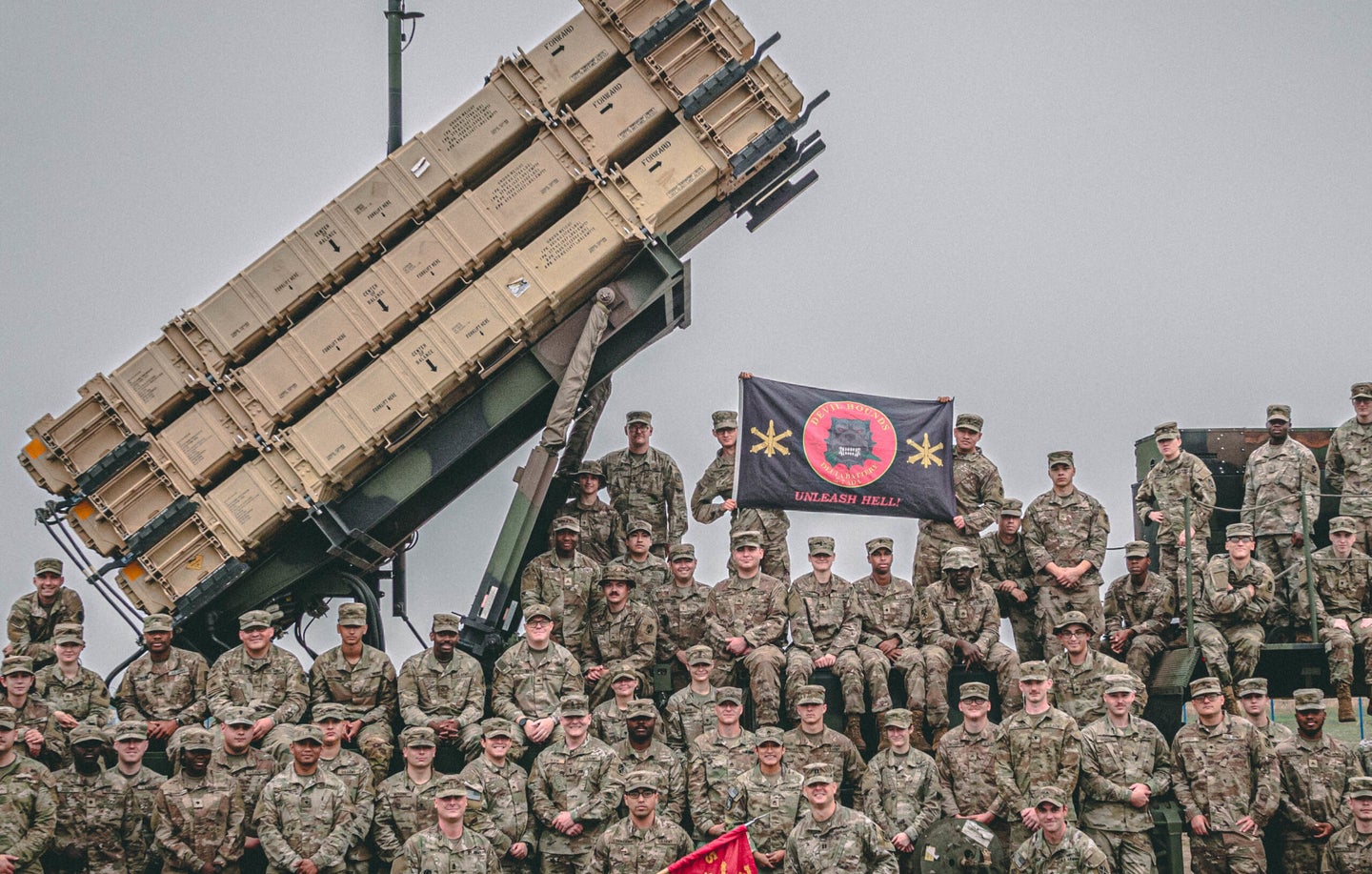 U.S. Army air defenders assigned to 5th Battalion, 7th Air Defense Artillery Delta Battery pose on a 10th Army Air Missile Defense Command Patriot launching station. The Army is adding positions for 7,500 soldiers in air and missile defense while also cutting thousands of unfilled positions for its plan to restructure the entire force.  Army photo by Sgt. 1st Class Christopher Smith)