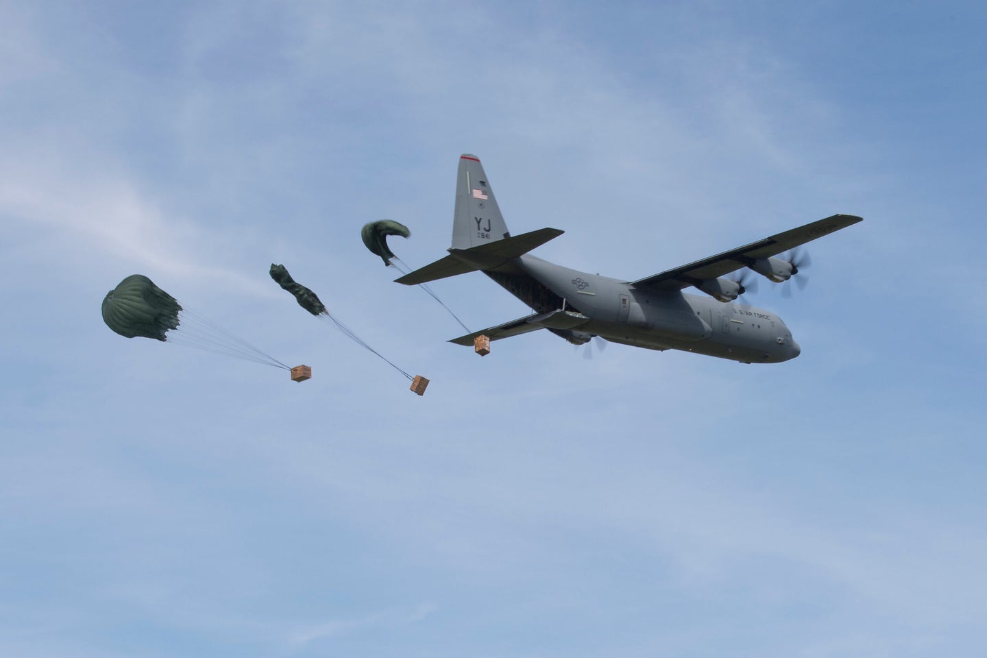 A C-130J Hercules dropping humanitarian aid.