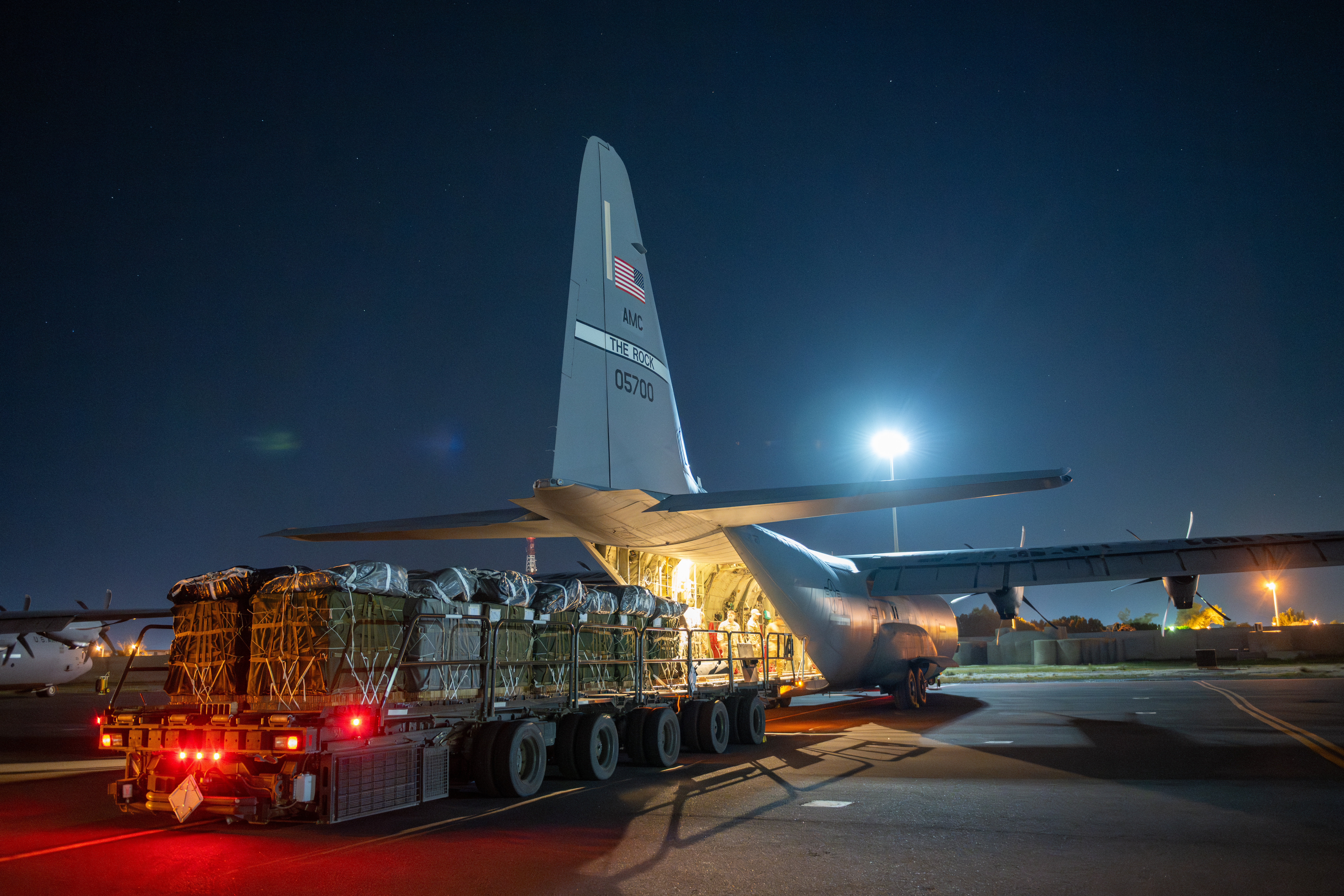 Over 38,000 Meals Ready to Eat and water destined for an airdrop over Gaza are loaded aboard a U.S. Air Force C-130J Super Hercules at an undisclosed location in Southwest Asia March 1, 2024. The U.S. Air Force’s rapid global mobility capability enables the expedited movement of critical, life-saving supplies throughout the Middle East. (U.S. Air Force courtesy photo)