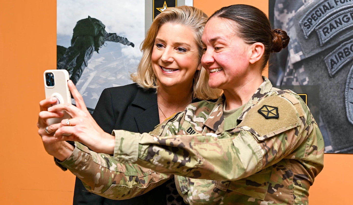 Secretary of the Army Christine Wormuth poses for a selfie with a warrant officer candidate going through the selection process at Fort Knox. Wormuth visited Fort Knox, Kentucky March 12 to meet candidates for the 420T Talent Acquisition Technicians MOS. Photo by Sgt. David Resnick.