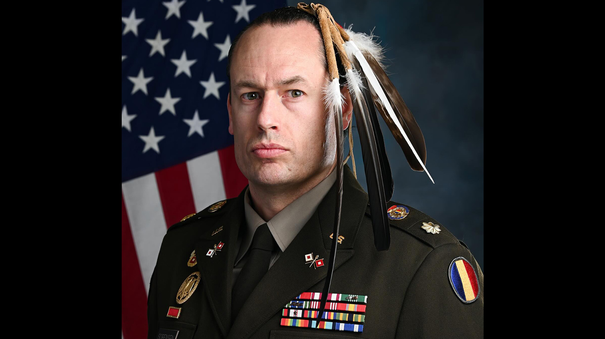 Army major honors fallen soldiers with Native eagle feathers in hair