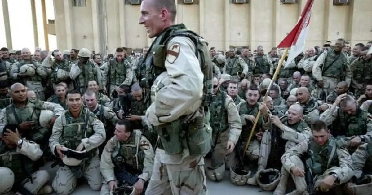 Then-Lt. Col. Gary Volesky, commander, 2-5 Cav., addresses Soldiers of Task Force Lancer in April 2004 at Camp War Eagle, shortly after the unit’s arrival in Sadr City. 