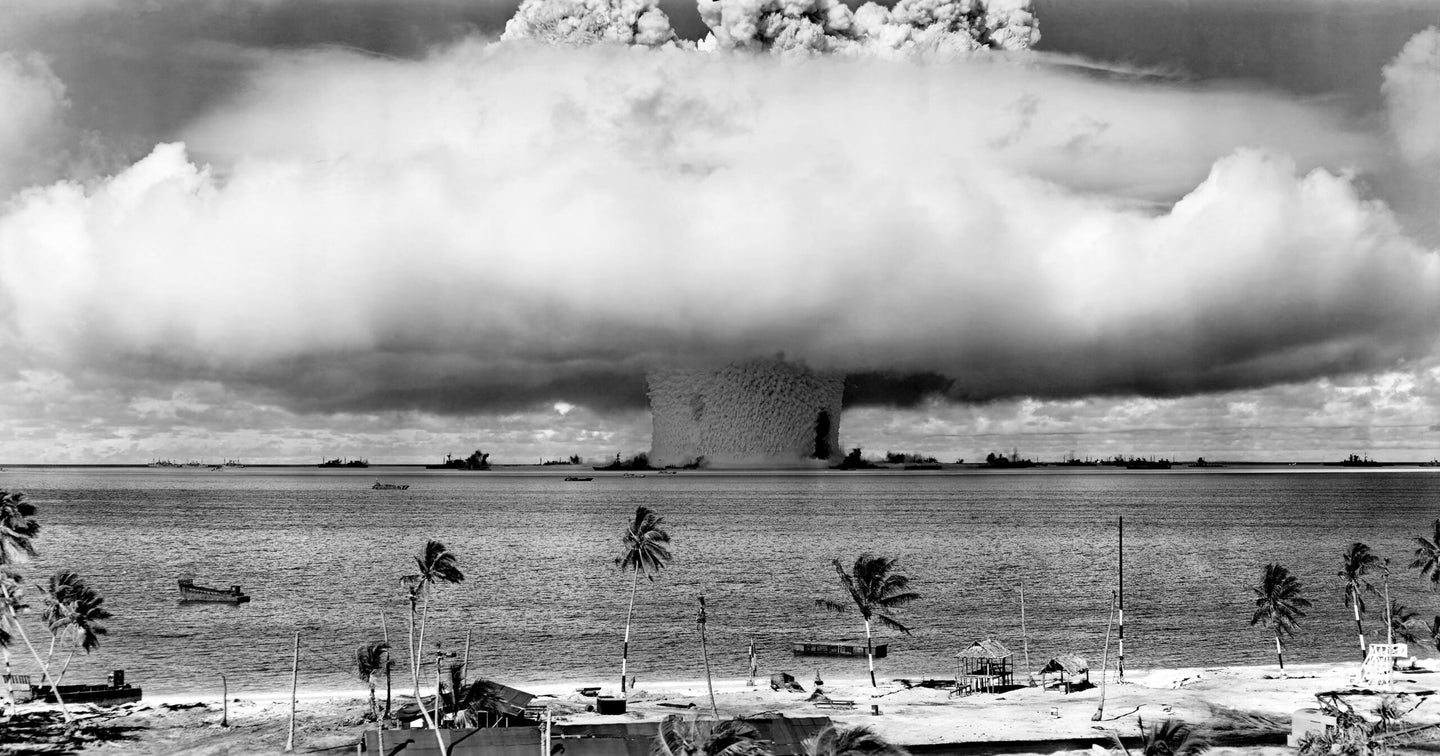USA/Marshall Islands: Mushroom-shaped cloud and water column from the underwater Baker nuclear explosion of July 25, 1946. Photo taken from a tower on Bikini Island, 3.5 miles (5.6 km) distant. (Photo by: Pictures from History/Universal Images Group via Getty Images)