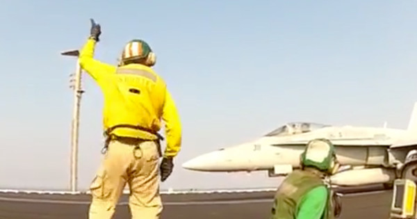 Hilarious Video Shows Navy Carrier Officers Having Way Too Much Fun Launching Aircraft