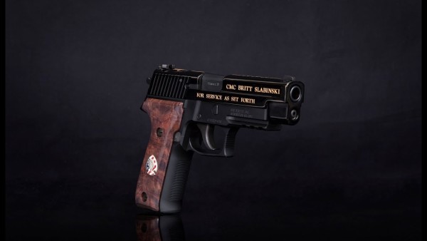 Sig Sauer unveils slick commemorative pistol to honor Navy SEAL Medal of Honor recipient